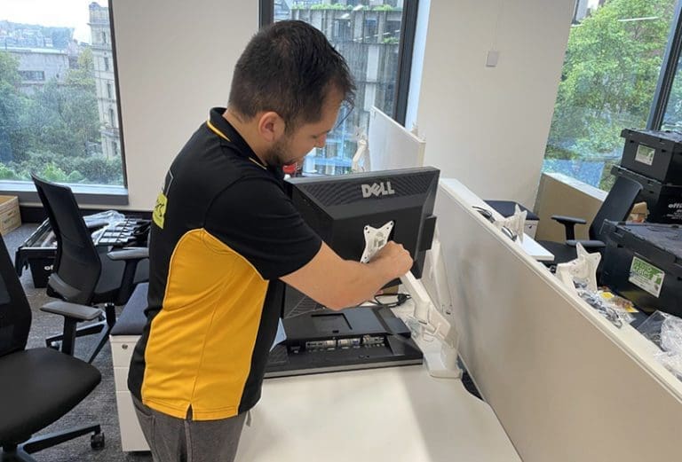 Professional office movers organising a workspace in Sydney